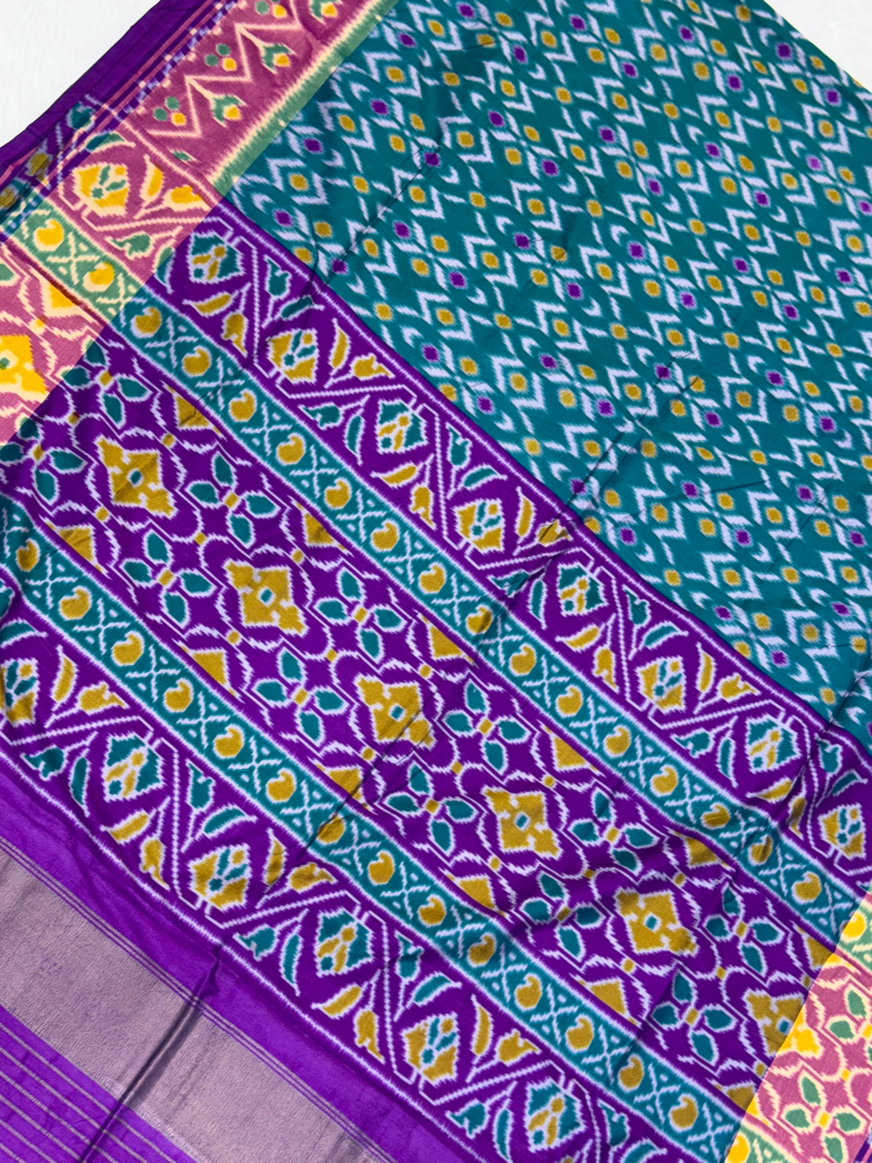 Bottle green ikkat design pure look patola saree