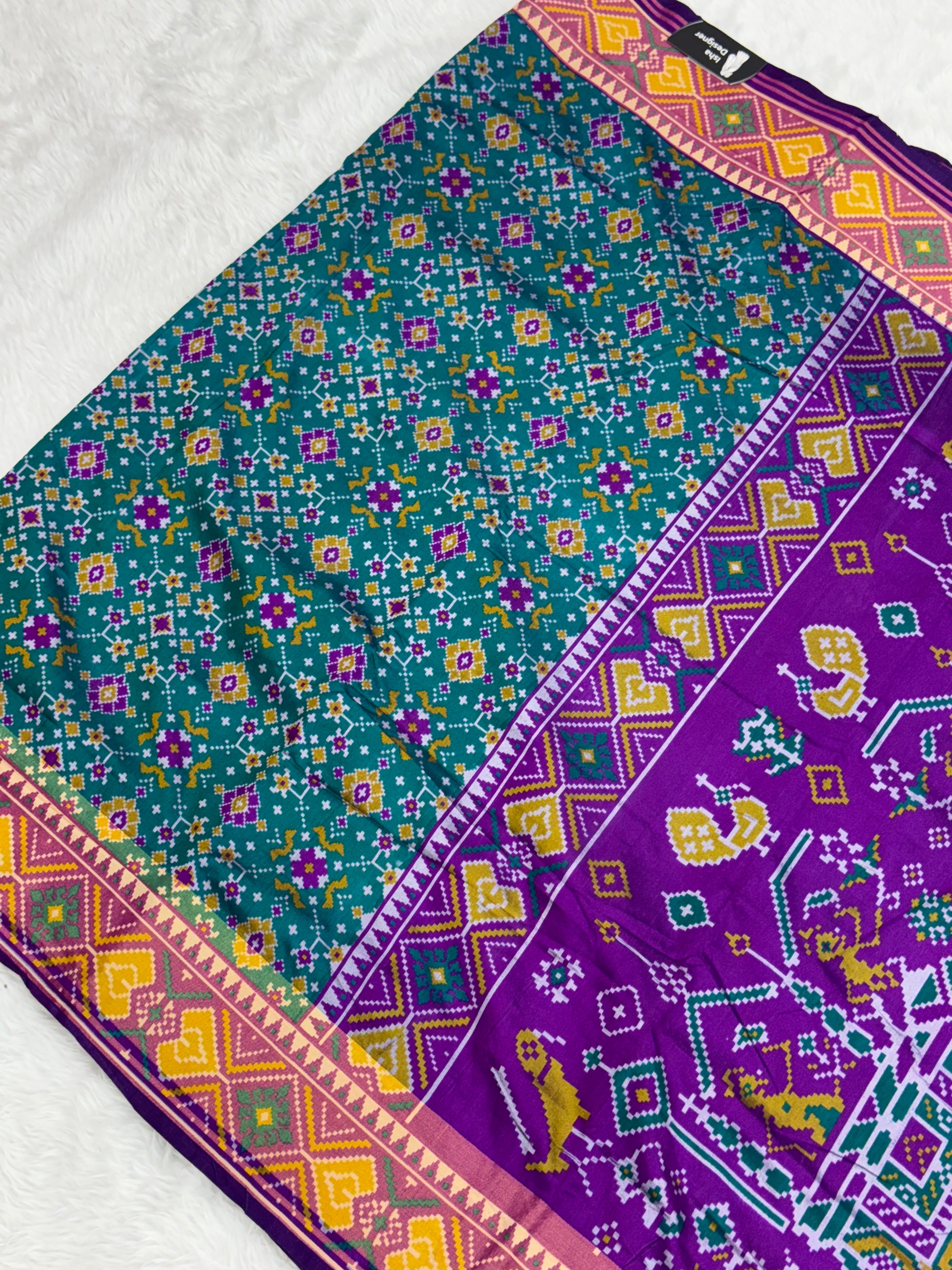 Bottle green ajrakh design pure look patola saree